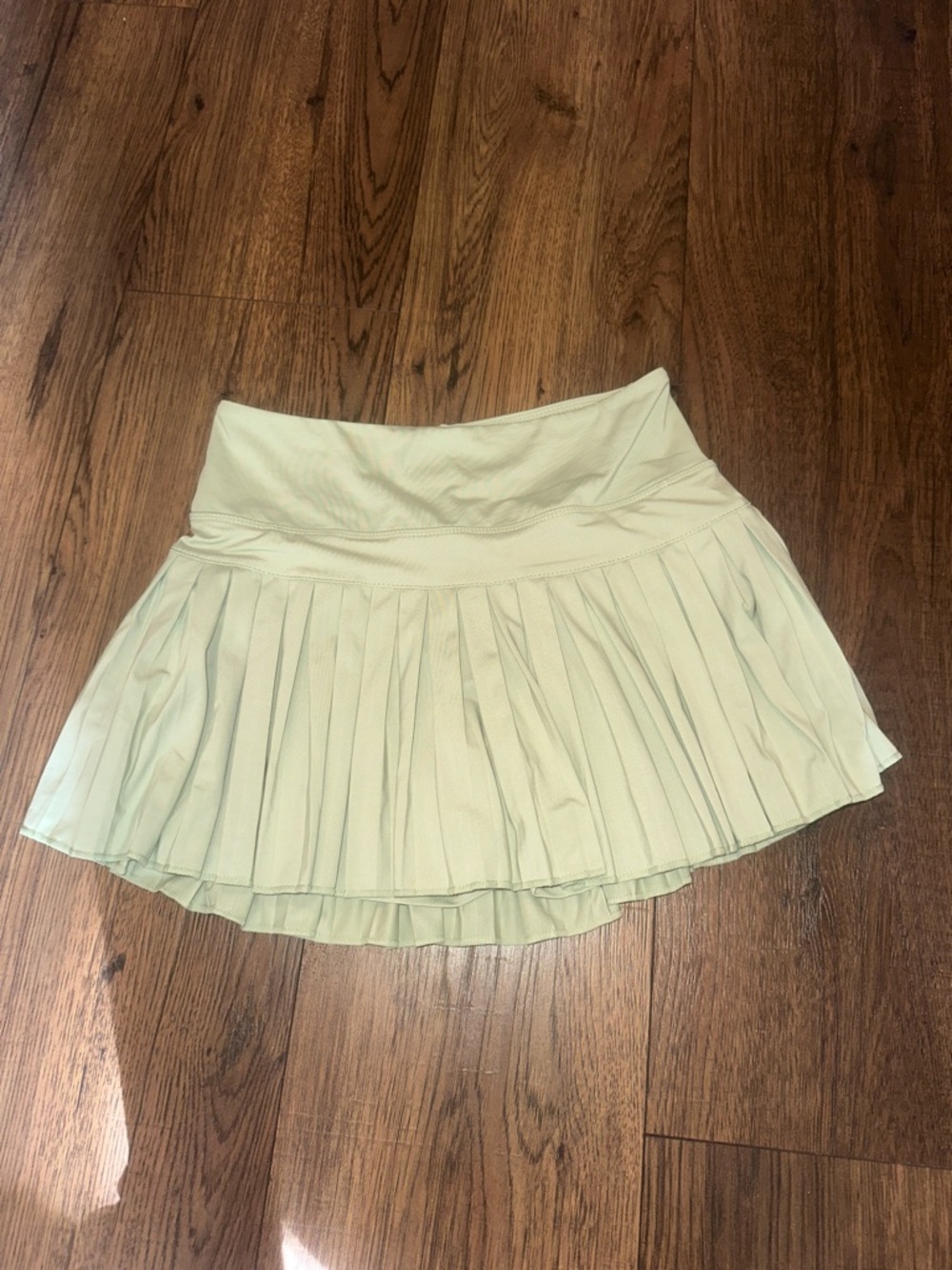 Gold hinge green tennis skirt